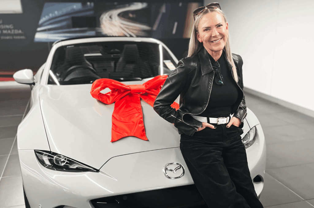 Mazda MX5 Grey Red Bow Happy Female Buyer Red Plum Automotive Car Buying Service